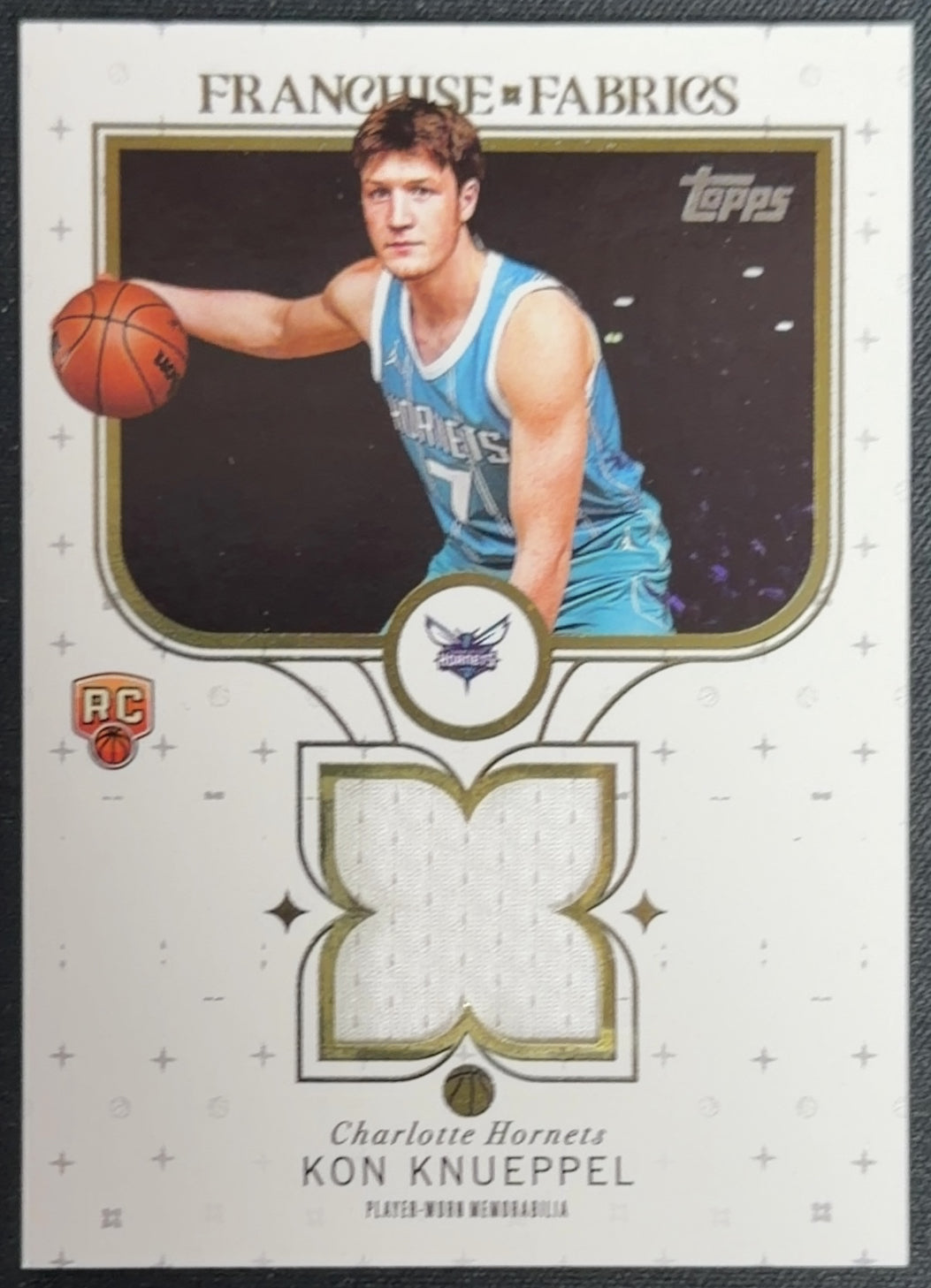 2025-26 Topps Kon Knueppel RC Franchise Fabrics #FF-KK Hornets