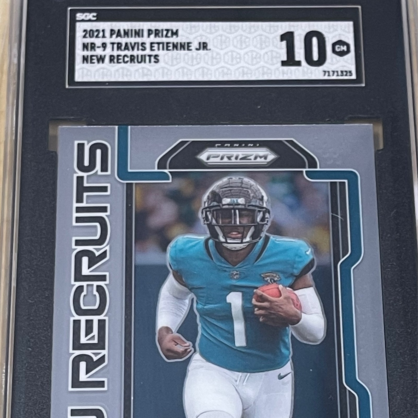 Travis Etienne	2021	Panini Prizm	NR-9	New Recruits		SGC 10