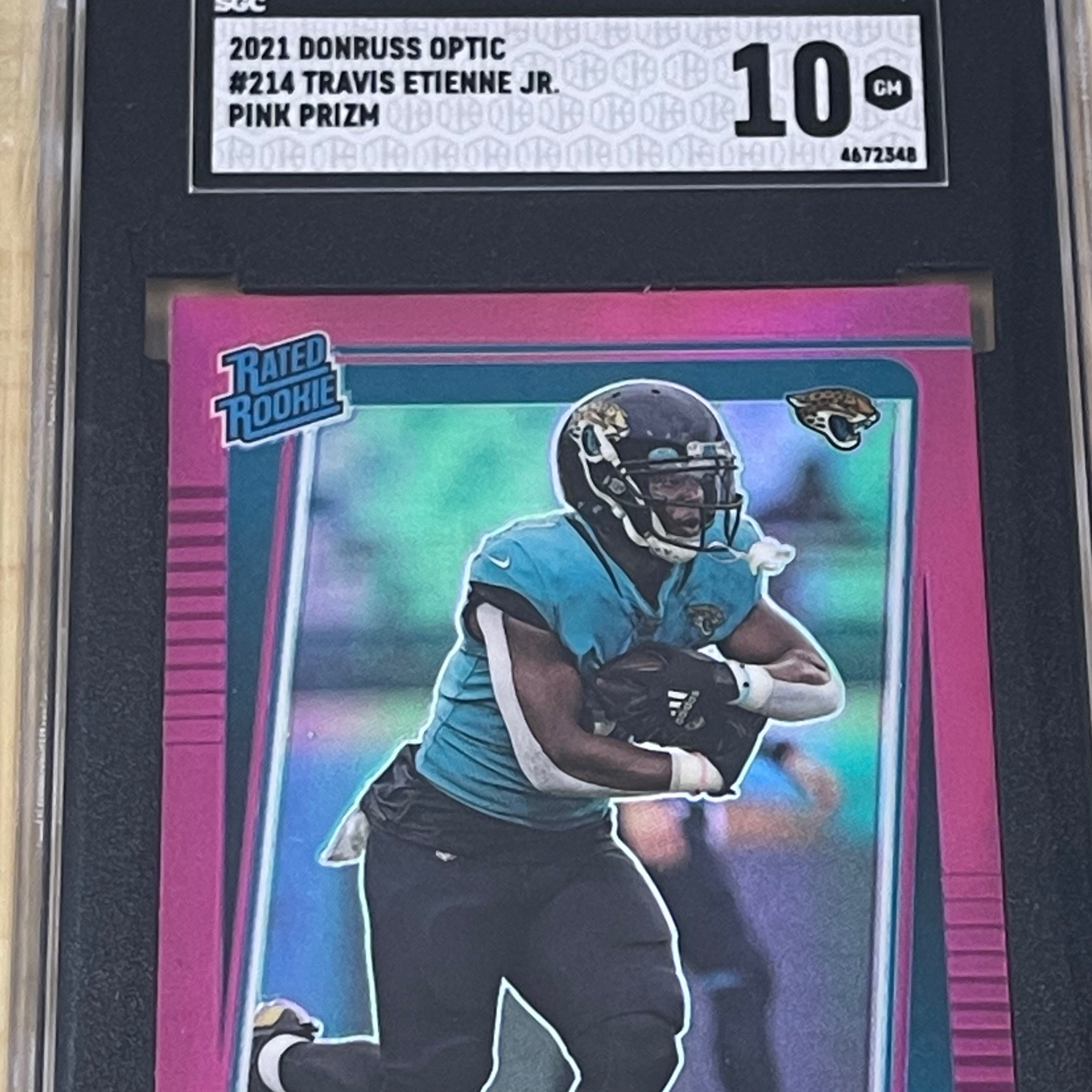 Travis Etienne Football 2021 Donruss Optic #214 Pink Prizm SGC 10